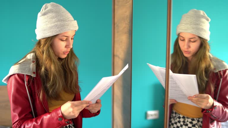 English learner practicing speaking in front of a mirror